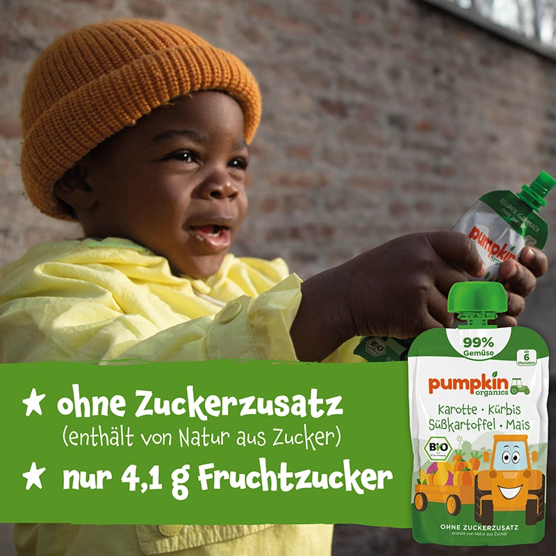 Baby hält Bio Gemüse Quetschie ohne Zuckerzusatz mit ur 4,1g Fruchtzucker