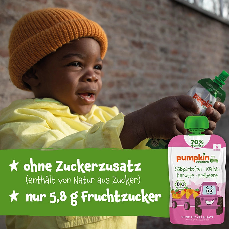 Kleines Kind isst Bio Gemüse Quetschie ohne Zuckerzusatz und nur 5,8g Fruchtzucker